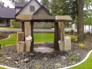 Basalt archway fountain