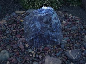 LED light within well of fountain