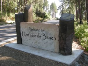 Honeysuckle Beach sign